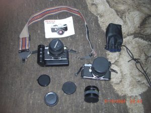 2 Pentax 35 mm cameras